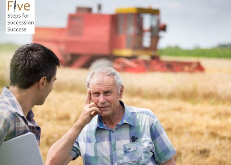Two farmers talking in wheat field in front of combine harvester FSSA 5 Steps for Succession